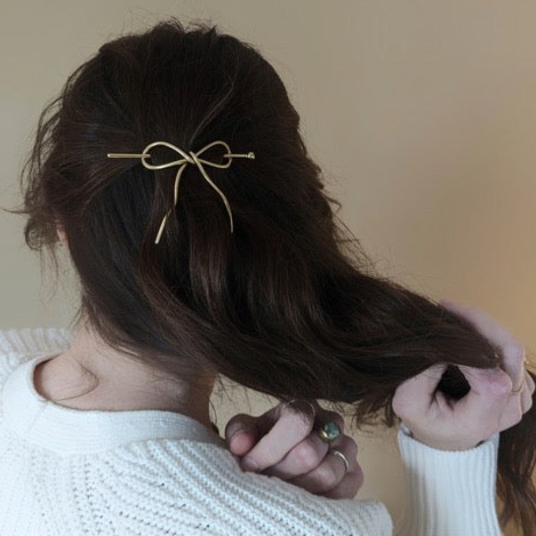 Brass Bow Hairpin brunette woman model