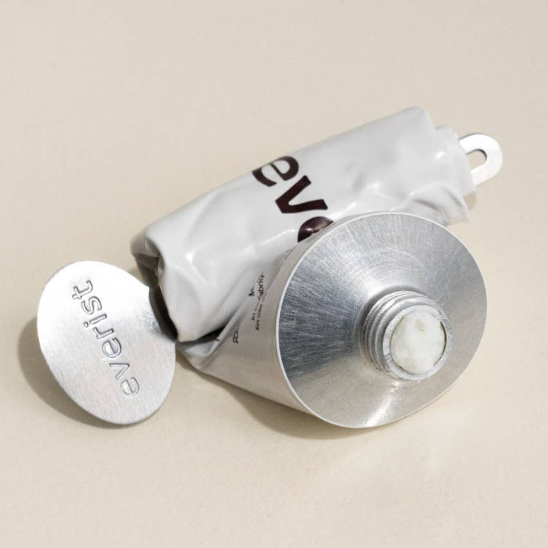 The Body Wash Concentrate tube squeezed our with the key included.