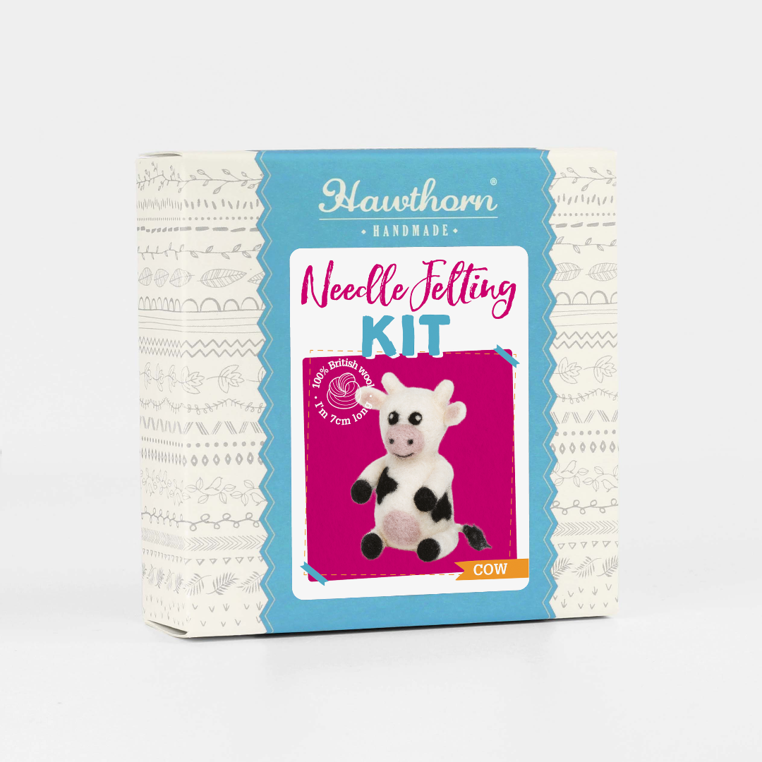 Hawthorn Handmade needle felting kit packaging with a cow illustration on a white background