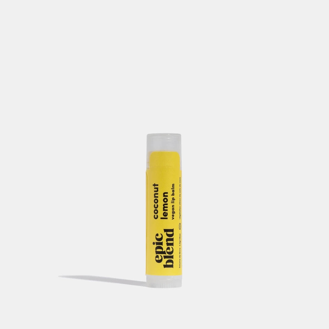 A yellow tube of Epic Blend Coconut Lemon Vegan Lip Balm. The label on the tube features the product name and indicates that it is vegan.