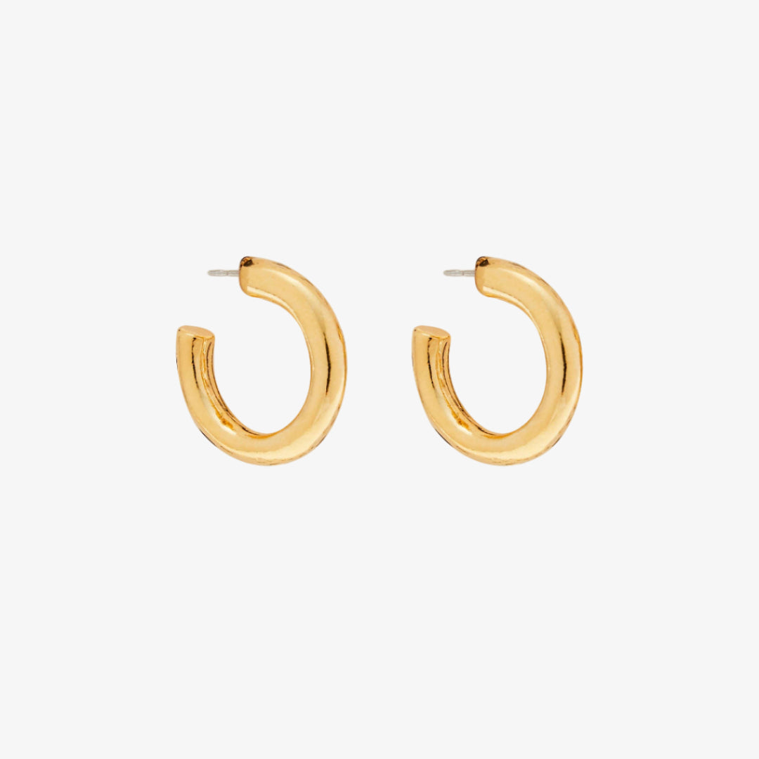 Gold hoop earrings on a white background