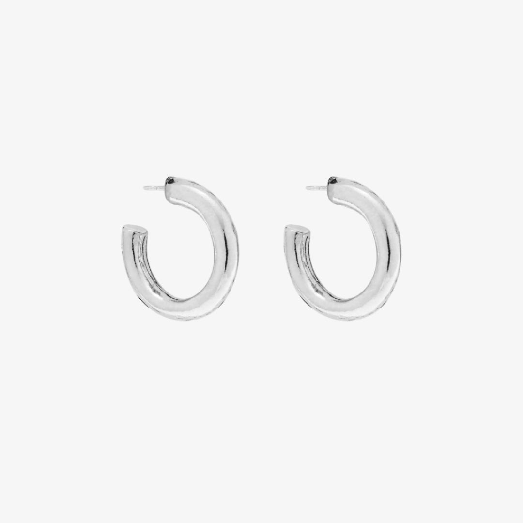 Silver hoop earrings on a white background