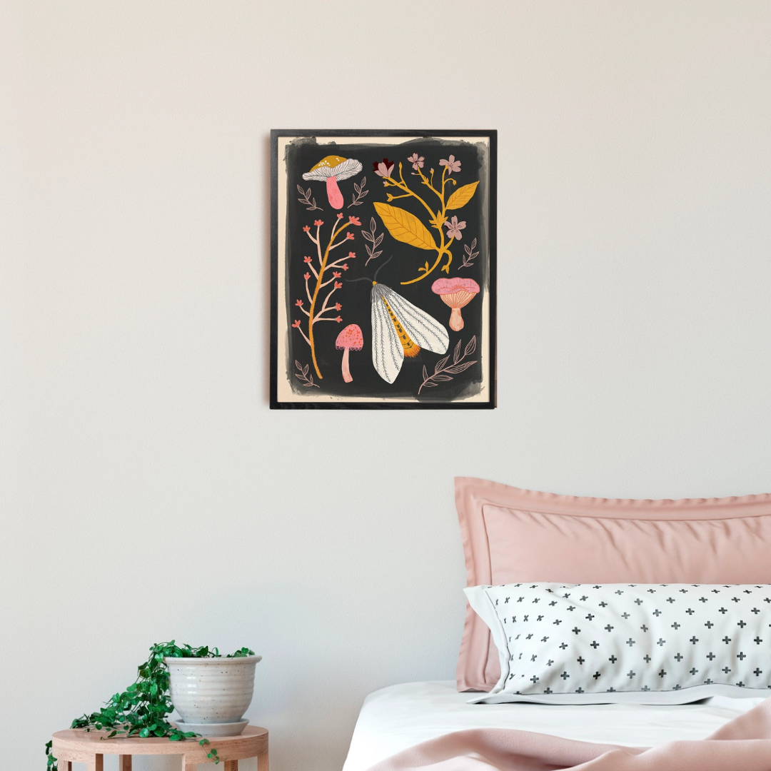 Nature Specimens Framed Art Print, a black art print with pink and gold images of mushrooms, and florals, in a black frame.