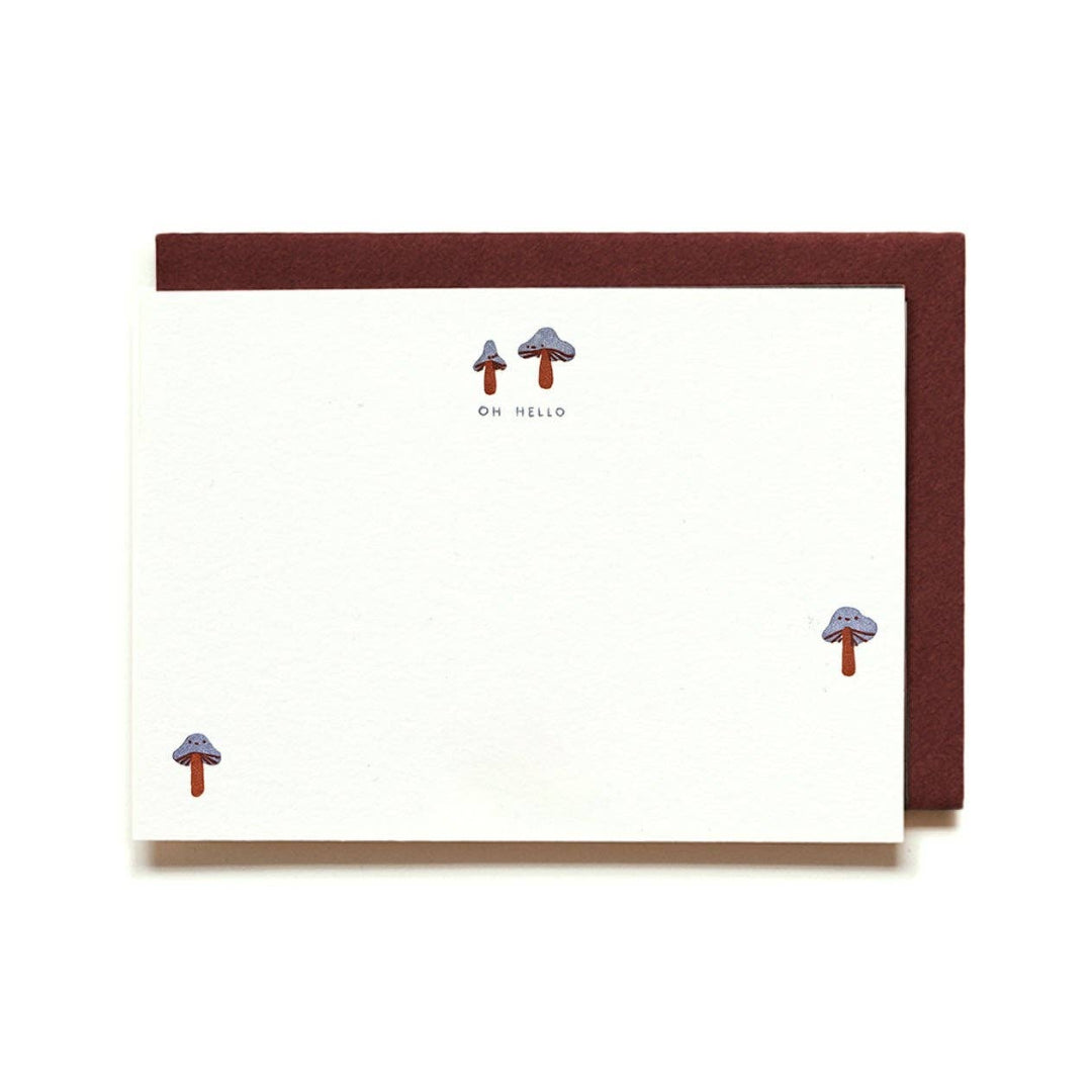 Note card with mushroom illustrations and 'On Hello' text on a white background