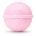 Pink bath bomb on a white background
