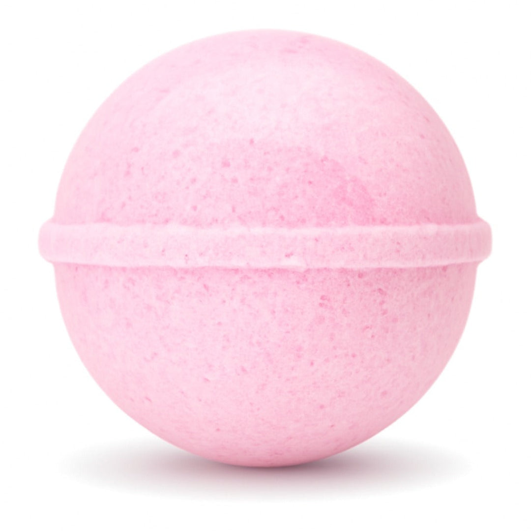 Pink bath bomb on a white background